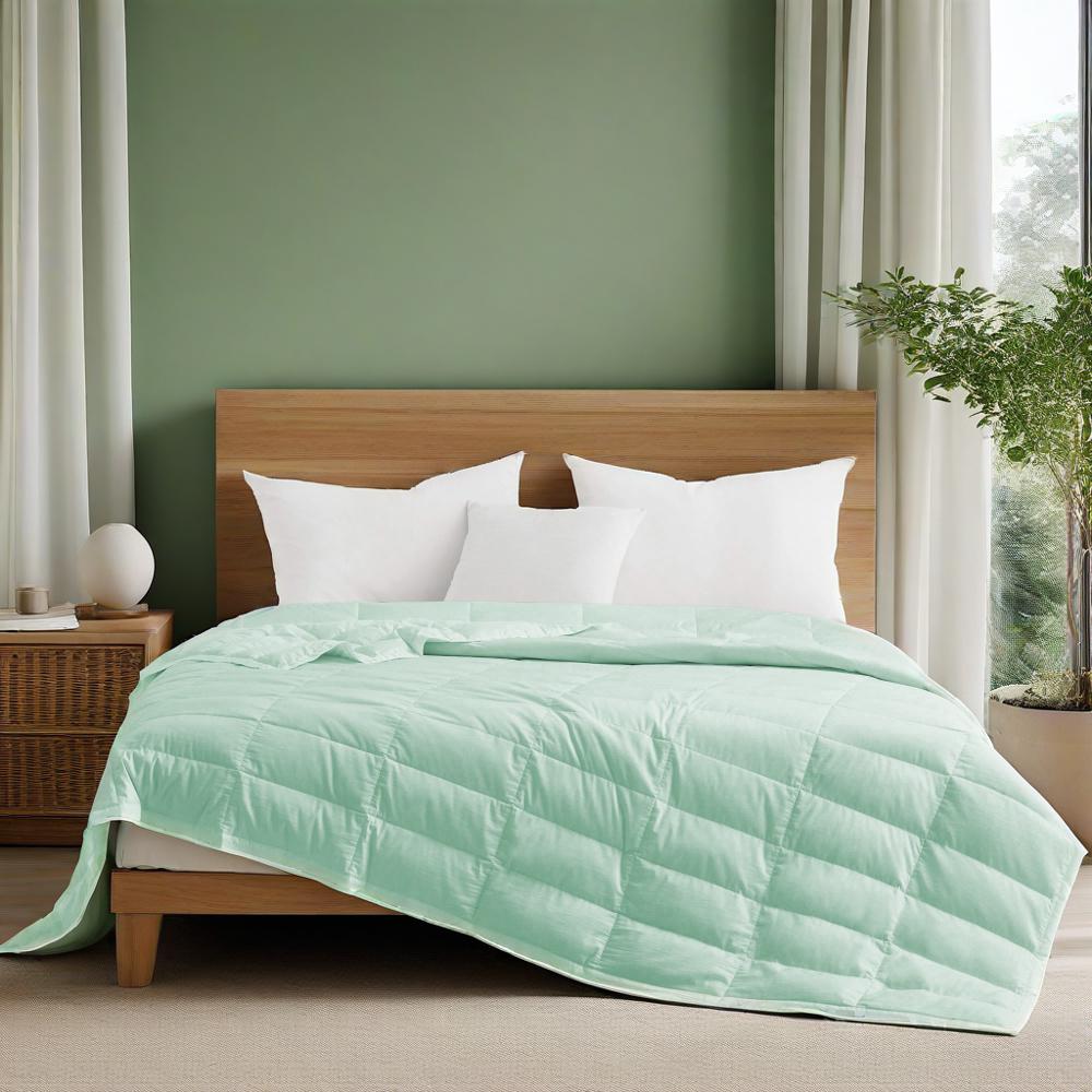 The eco-friendly tencel duvet cover comforter is brushed in the invigorating hues of Mint. Bring the freshness of nature to your room with this cooling down blanket in Mint.