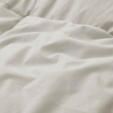 Add natural warmth and texture to your bedroom with our Oatmeal Organic Cotton Down Comforter. The soft, earthy oatmeal tone brings a calming, neutral aesthetic that blends effortlessly with modern, rustic, or minimalist decor. Made with GOTS-certified organic cotton and filled with 100% down and feather fiber, this comforter delivers breathable, all-season comfort with a cloud-like feel. Lightweight yet cozy, it's perfect for year-round use, offering natural insulation and moisture-wicking properties to he