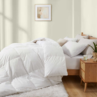 The white goose feather comforter is covered in the serene colors of white. Let the light pour into your room with this white feather comforter.