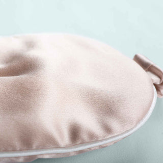 The contoured mask with a smooth surface is enveloped in the pristine hues of dawn pink. Add a feminine touch to your sleep accessories with this eye mask.