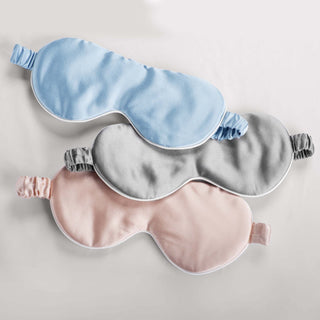 The adjustable mask is brushed in the ethereal tones of cloudy blue. Sleep soundly wearing this silky eye mask, made using silk as an interior and exterior material. The rest eye mask is covered in pale hues of grey. Sleep peacefully by putting on this silk sleep eye mask. The contoured mask with a smooth surface is enveloped in the pristine hues of dawn pink. Add a feminine touch to your sleep accessories with this eye mask.