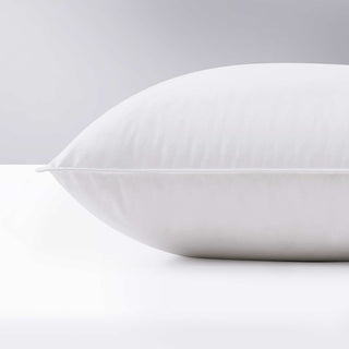 The Puredown pillow is covered in crisp white hues. Add a touch of classic intrigue to your bedspace with these white down pillows.
