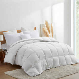 The fluffy comforter is brushed in the immaculate hues of white. Add a touch of modern minimalism to your bedroom décor with this white goose feather comforter.