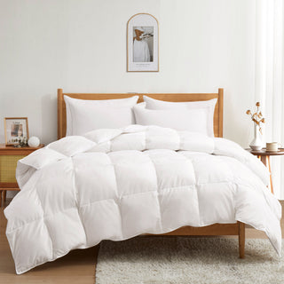 The down feather comforter is covered in solid colors of white. Add an air of elegance and bring perfect levels of warmth to your bedding decor, turning it into a cozy spot with this white color down comforter.