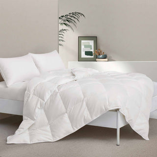 Fresh white tones are brushed over the wonderful comforter. Add a touch of luxury to your modern bedroom design with this down comforter.