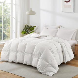 This down comforter is decorated in solid colors of white. Bring light, brilliance, and contemporary trends to your modern bedroom design with this down white feather warm comforter.