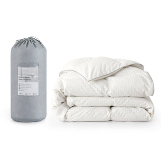 This down comforter is decorated in solid colors of white. Bring light, brilliance, and contemporary trends to your modern bedroom design with this down white feather warm comforter.