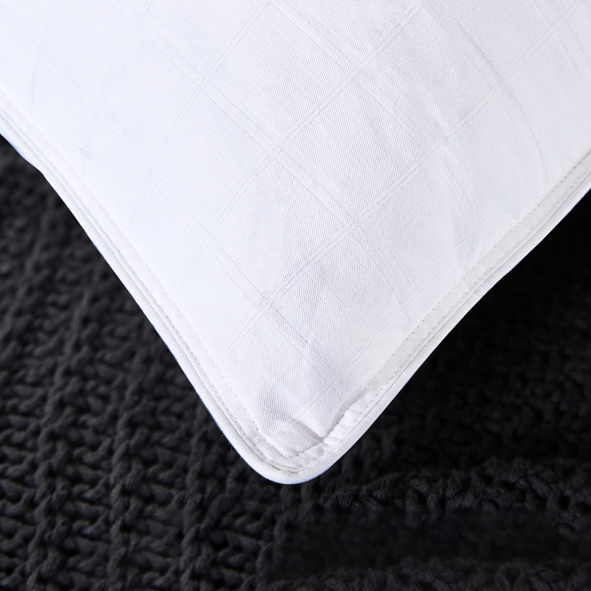 This medium-firm option in pillows with goose feathers is colored in the serene white hues. Adding these down feather pillows to your bedroom will give it an inviting atmosphere and luxurious feel.