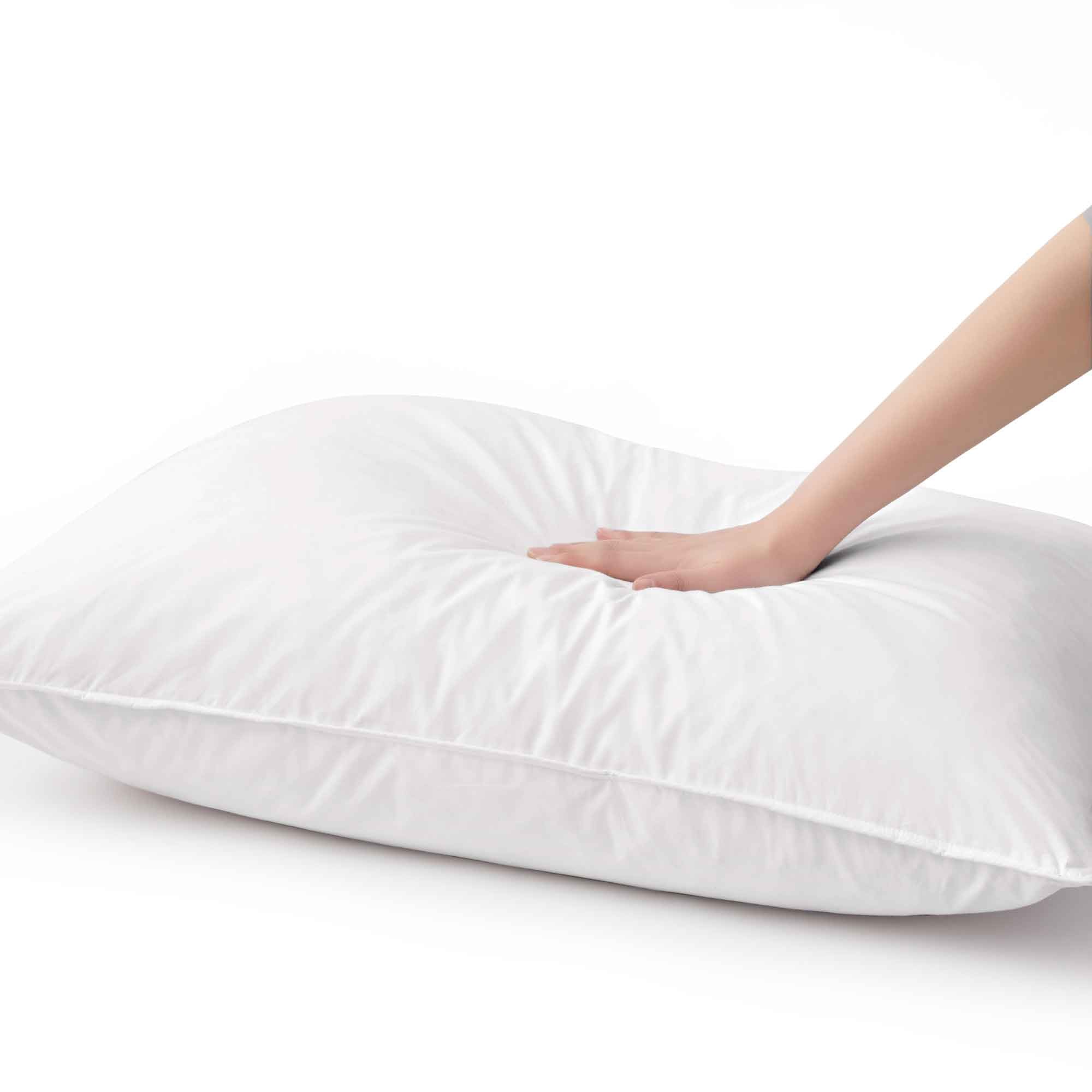The plush pillow design is colored in the harmonious tones of white. Add a welcoming feel and luxurious comfort to your bedroom space with these overstuffed feather pillows.