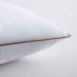 The Puredown down plush pillow is colored in soft tones of white. Bring a sense of minimalism to your bedroom space with these goose feather pillows.