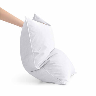 The down filled pillows are colored white. Create a serene aura in your personal space with these feather and down pillows.