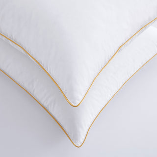 The pillows are brushed in crisp and solid white hues. Your bedroom will be transformed into a luxurious haven with these real feather pillows.