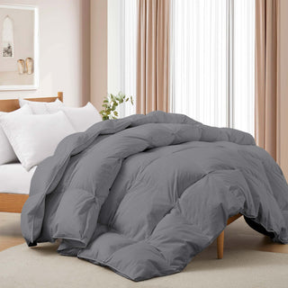 The grey comforter is enveloped in smoky grey tones. Add a touch of minimal style to your bedroom decor with this high-quality material comforter with durable fabric for all seasons.