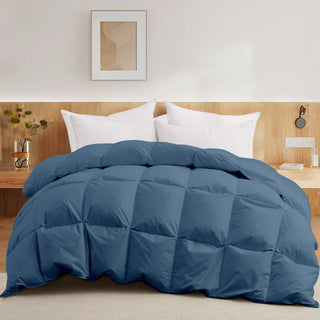 The feather down comforter is covered in navy blue hues. Infuse elegant and breathable style into your personal space for a comfortable night’s sleep with this double stitching design comforter.