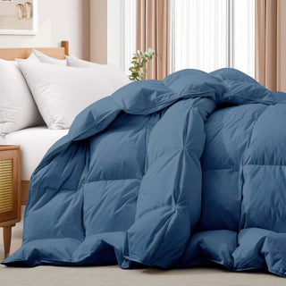 The feather down comforter is covered in navy blue hues. Infuse elegant and breathable style in your personal space with this double stitching comforter.