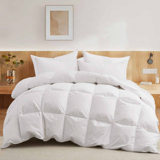 This cotton cover down comforter is painted in blissful shades of white. Bring an aesthetic elegance to your bedding with this comforter on a cold night sleep.