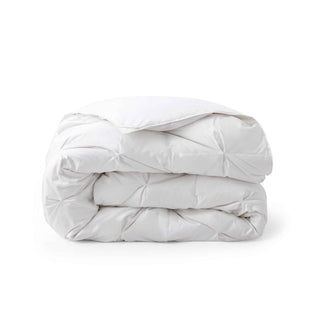The winter down comforter is colored in crisp tones of white. Give your room a sense of space with this heavyweight down comforter.