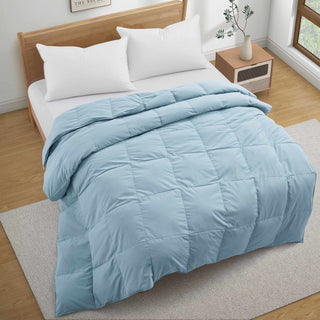 Wrap yourself in the warmth and comfort of our all-season use comforter in a sophisticated steel blue shade, offering a cozy and luxurious way to stay comfortable and stylish throughout the night.