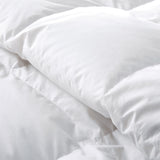 The goose down construction comforter set is colored in the immaculate tones of white. Bring an air of subtleness and minimalism to your bedroom with the Puredown white colored goose down comforter.