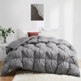 Transform your bedroom into a serene and tranquil oasis with our goose down comforter in a chic and versatile grey shade. This grey down comforter offers a cozy and stylish way to stay warm and comfortable all night long.