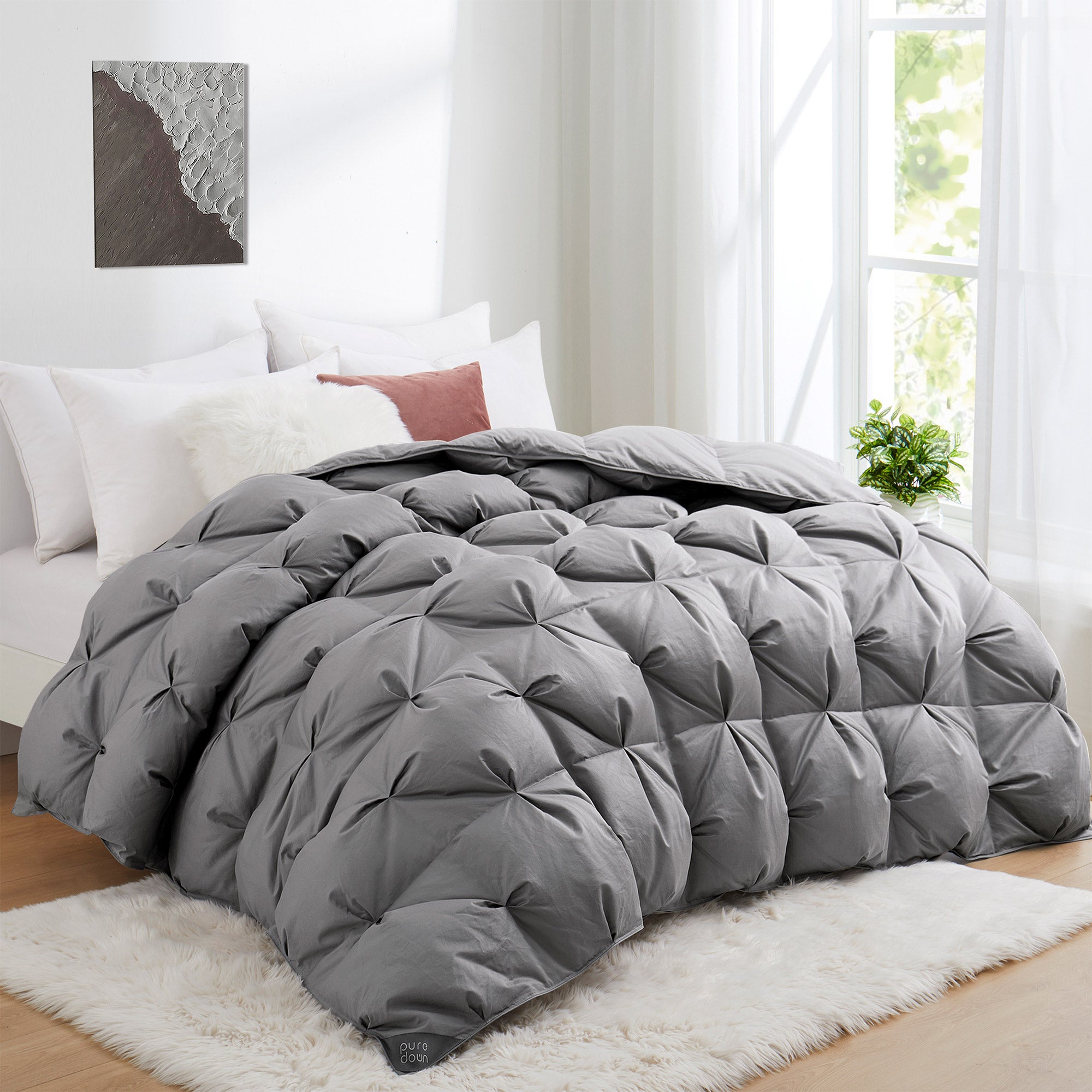 Transform your bedroom into a serene and tranquil oasis with our goose down comforter in a chic and versatile grey shade. This grey down comforter offers a cozy and stylish way to stay warm and comfortable all night long.