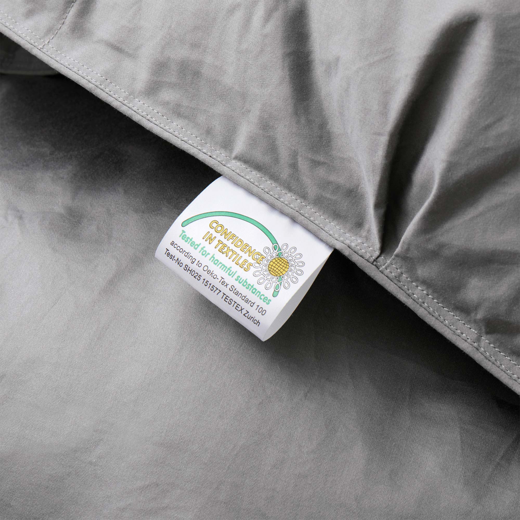 Transform your bedroom into a serene and tranquil oasis with our goose down comforter in a chic and versatile grey shade. This grey down comforter offers a cozy and stylish way to stay warm and comfortable all night long.
