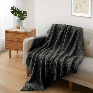 The warmest throw is covered in the darker color of carbon grey. A perfect gift idea, bring a bold appeal to your abode with this cozy warm blanket throw.