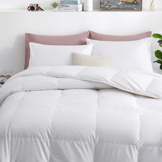 The entire comforter is enveloped in the serene white shades. Elevate your bedding décor to the next level with this white feather-down comforter.