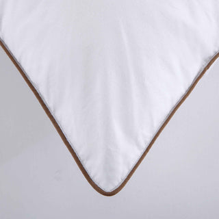 The Puredown down plush pillow is colored in soft tones of white. Bring a sense of minimalism to your bedroom space with these goose feather pillows.