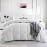 The goose down construction comforter set is colored in the immaculate tones of white. Bring an air of subtleness and minimalism to your bedroom with the Puredown white colored goose down comforter.