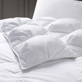 These white down comforters are colored in crisp tones of white. Give your room a sense of space with this down white comforter.