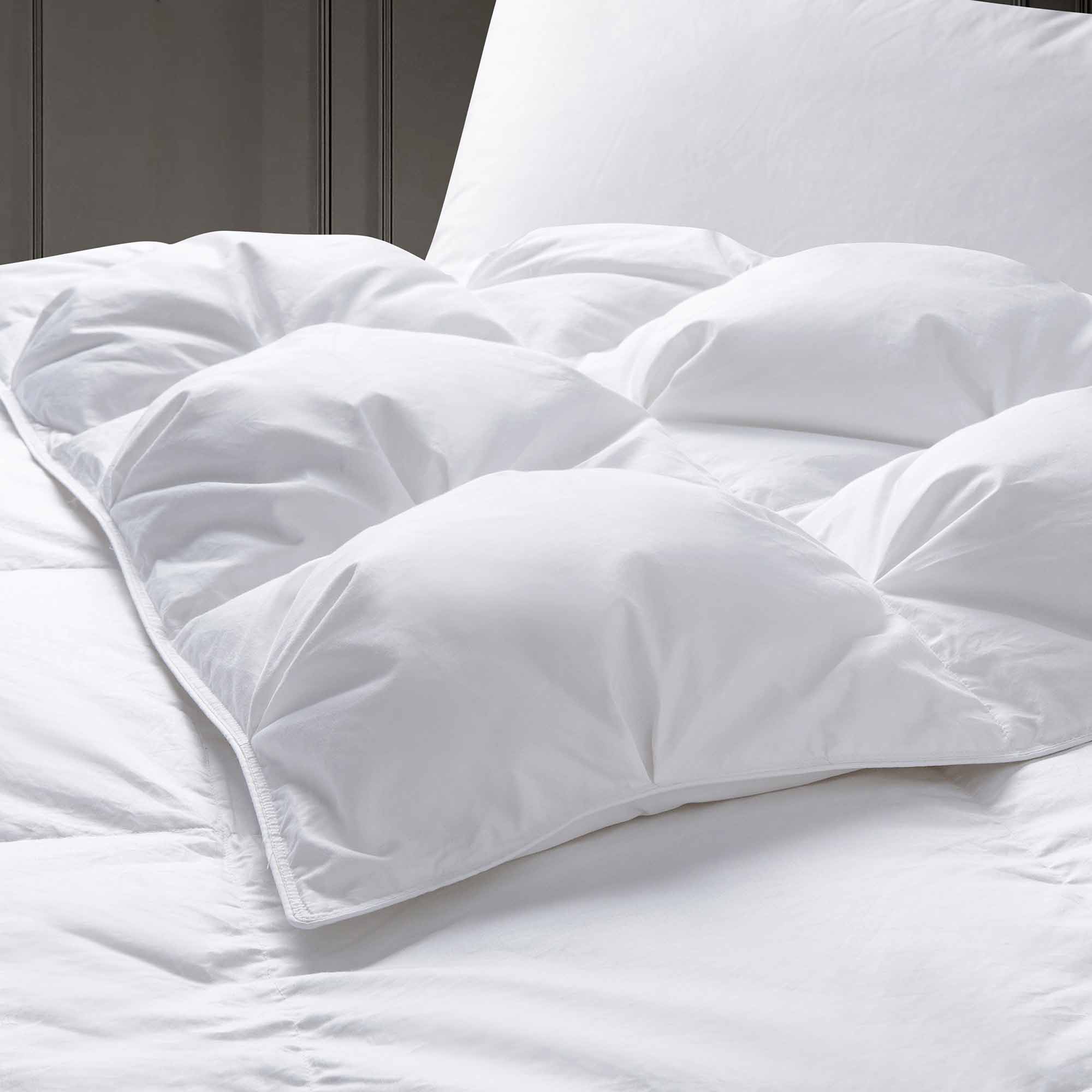 These white down comforters are colored in crisp tones of white. Give your room a sense of space with this down white comforter.
