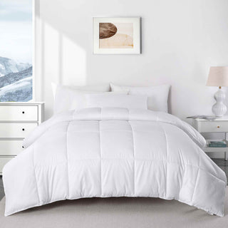 The all seasons down alternative comforter option is enveloped in the solid colors of white. Add a hint of stylish enamors to your modern bedroom design with this white alternative down comforter.