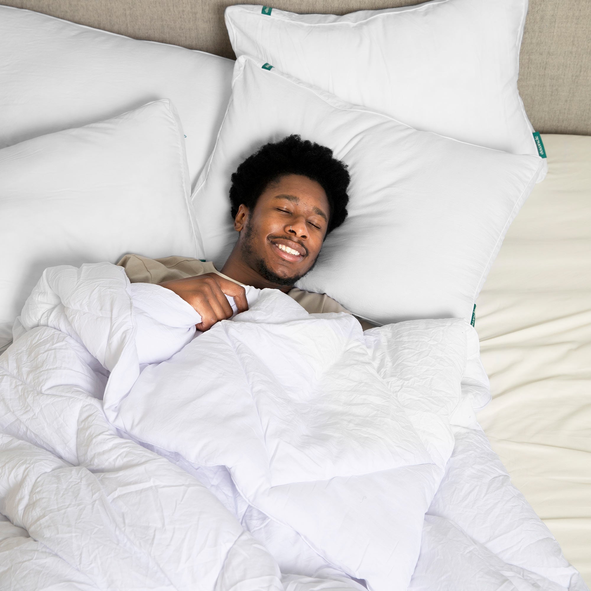 This entire bedding pillow is covered in solid white hues. Add a touch of sophistication to your bedroom with this down goosefeather pillow.
