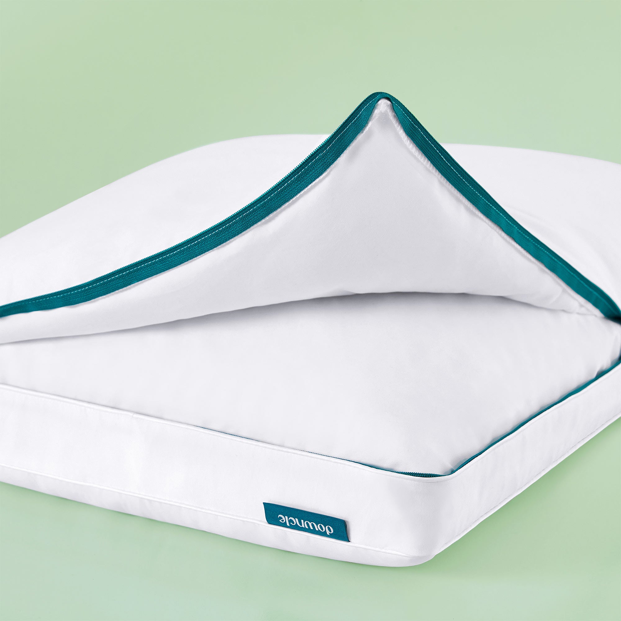 This entire bedding pillow is covered in solid white hues. Add a touch of sophistication to your bedroom with this down goosefeather pillow.